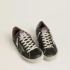 Super-Star para hombre en cuero negro con estrella de gamuza gris y lengüeta en el talón