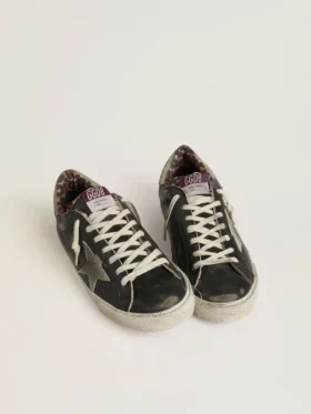 Super-Star para hombre en cuero negro con estrella de gamuza gris y lengüeta en el talón
