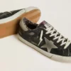 Super-Star para hombre en cuero negro con estrella de gamuza gris y lengüeta en el talón