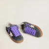 Super-Star para hombre en gamuza gris con estrella de cuero blanco y lengüeta de talón de cuero plateado