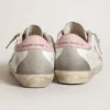Super-Star para mujer con estrella de gamuza gris y lengüeta del talón de cuero rosa