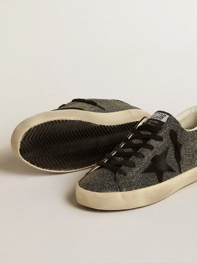 Super-Star para mujer en cristales Swarovski negros con estrella de gamuza negra