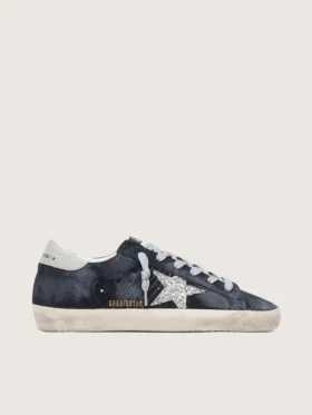 Super-Star para mujer en gamuza azul con estrella plateada brillante y lengüeta de cuero en el talón