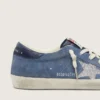 Super-Star para mujer en gamuza azul denim con estrella plateada brillante