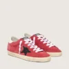 Super-Star para mujer en gamuza roja con estrella brillante y lengüeta blanca en el talón