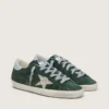 Super-Star para mujer en gamuza verde, con estrella plateada brillante y lengüeta de cuero en el talón