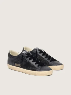 Super-Star para mujer en negro con purpurina, estrella de gamuza negra e inserciones de cuero