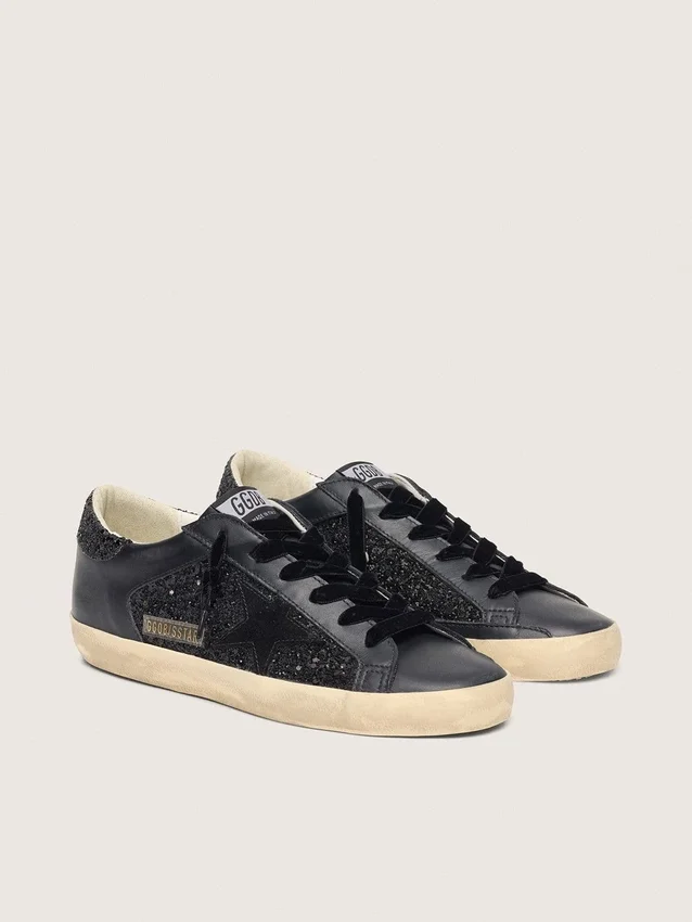 Super-Star para mujer en negro con purpurina, estrella de gamuza negra e inserciones de cuero