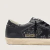Super-Star para mujer en negro con purpurina, estrella de gamuza negra e inserciones de cuero