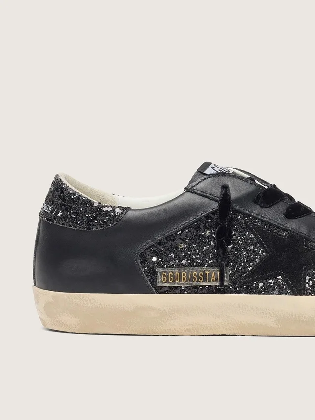 Super-Star para mujer en negro con purpurina, estrella de gamuza negra e inserciones de cuero