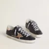 Super-Star para mujer en piel napa negra con estrella de piel de potro con estampado de cebra y lengüeta del talón de piel beige