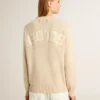 Suéter beige para mujer con letras «Golden» en la espalda