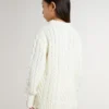 Suéter blanco de lana para niñas con perlas