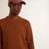Suéter de cuello redondo para hombre con logotipo en la espalda