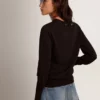 Suéter de cuello redondo para mujer en lana negra