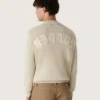 Suéter unisex de cuello redondo en algodón beige con parche en el frente y logotipo en la espalda