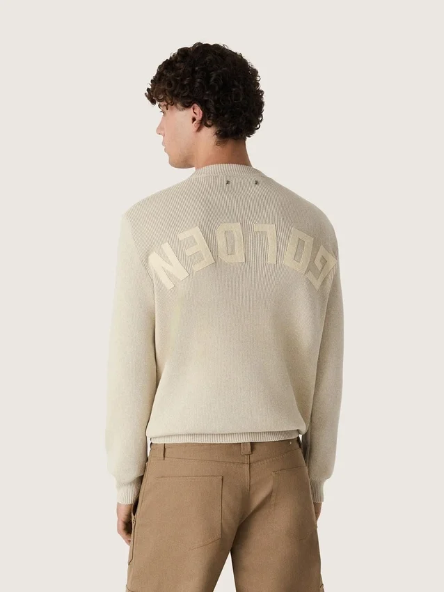 Suéter unisex de cuello redondo en algodón beige con parche en el frente y logotipo en la espalda