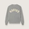 Suéter unisex Golden para niños en tejido acanalado gris jaspeado con logotipo en la espalda