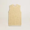 Top de malla con lentejuelas y detalles en contraste