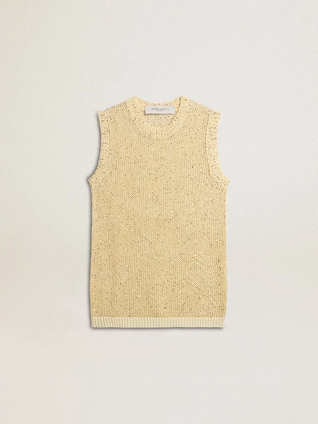 Top de malla con lentejuelas y detalles en contraste