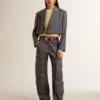 Top de malla con lentejuelas y detalles en contraste