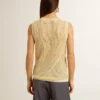 Top de malla con lentejuelas y detalles en contraste