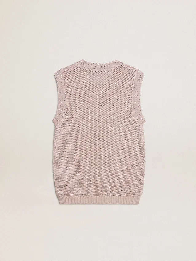 Top de malla con lentejuelas y detalles en contraste