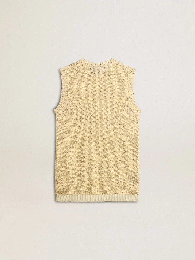 Top de malla con lentejuelas y detalles en contraste