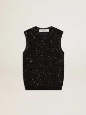 Top de malla negra con lentejuelas y detalles en contraste