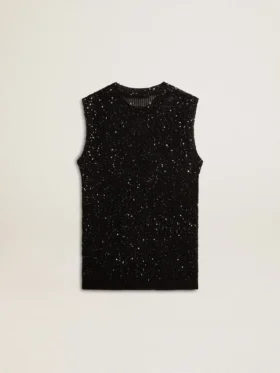 Top de malla negra con lentejuelas y detalles en contraste