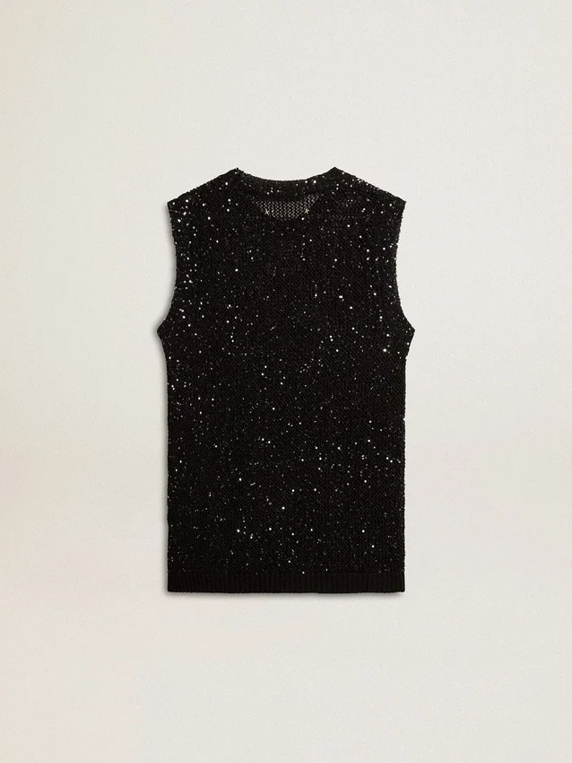 Top de malla negra con lentejuelas y detalles en contraste