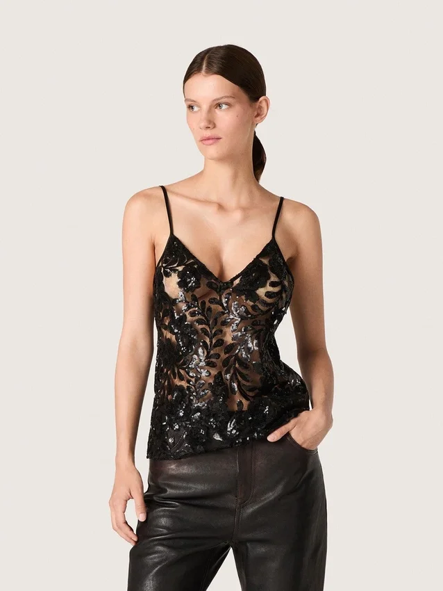 Top de mujer de tul negro con estampado floral de lentejuelas negras