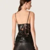 Top de mujer de tul negro con estampado floral de lentejuelas negras