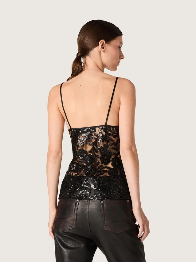 Top de mujer de tul negro con estampado floral de lentejuelas negras