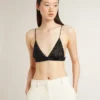 Top negro de croché con cristales para mujer