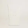 Top sin mangas bordado con ribetes en blanco desgastado