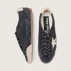 True-Star para hombre en gamuza azul oscuro con estrella y lengüeta en el talón de cuero napa blanco
