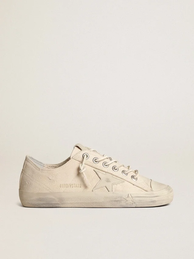 V-Star en lona color crema claro con estrella de cuero blanco lechoso