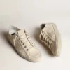 V-Star en lona color crema claro con estrella de cuero blanco lechoso