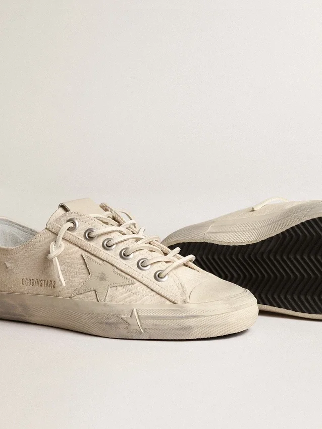 V-Star en lona color crema claro con estrella de cuero blanco lechoso