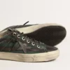 V-Star para hombre en lona a rayas negras y verdes con estrella y puntera de cuero negro