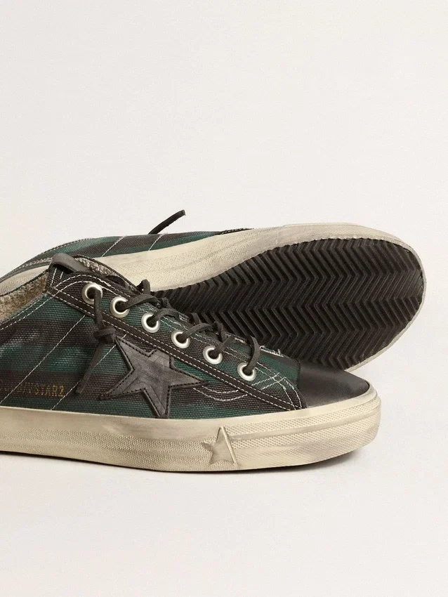 V-Star para hombre en lona a rayas negras y verdes con estrella y puntera de cuero negro
