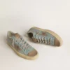 V-Star para hombre en lona azul claro con estrella de cuero gris paloma