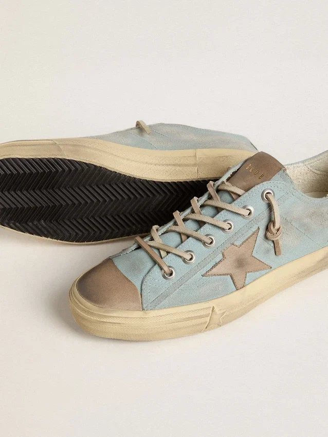 V-Star para hombre en lona azul claro con estrella de cuero gris paloma