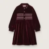 Vestido para niñas en color burdeos con efecto terciopelo y bordado en la parte delantera