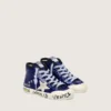 Francy Penstar junior en lentejuelas azules con estrella de gamuza blanca