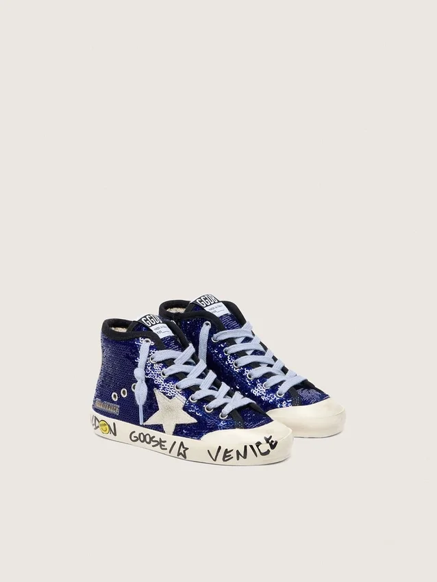 Francy Penstar junior en lentejuelas azules con estrella de gamuza blanca