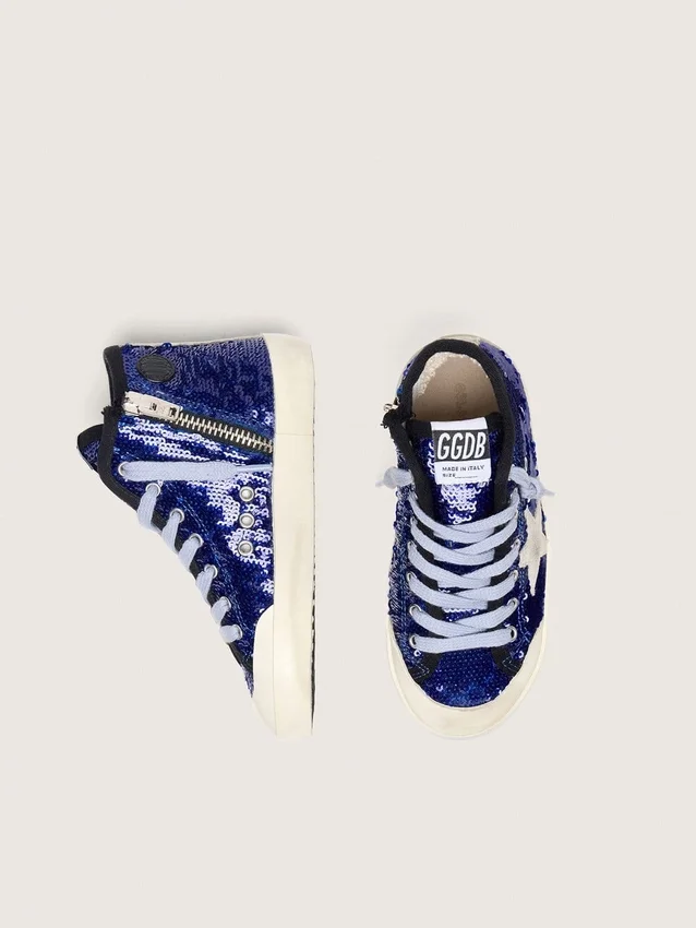 Francy Penstar junior en lentejuelas azules con estrella de gamuza blanca