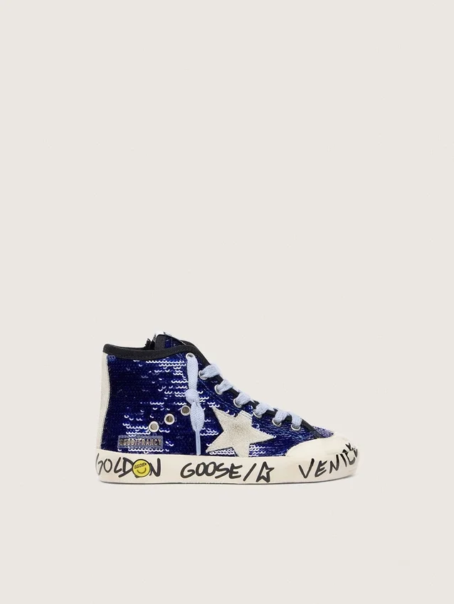 Francy Penstar junior en lentejuelas azules con estrella de gamuza blanca