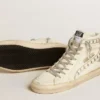 Zapatilla Slide con estrella de cuero metalizado plateado y detalle de cuero con estrellas